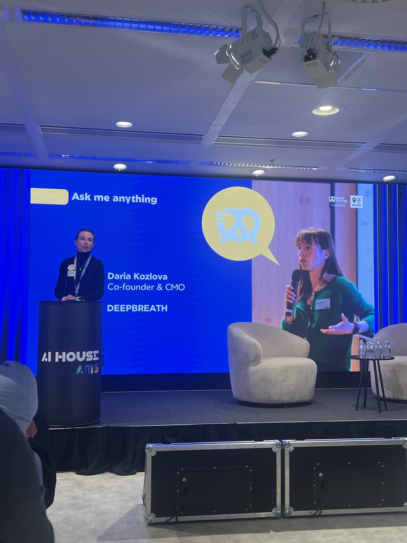 Daria Kozlova, Co-founder & CMO of Deep Breath, speaking at AI HOUSE AMS